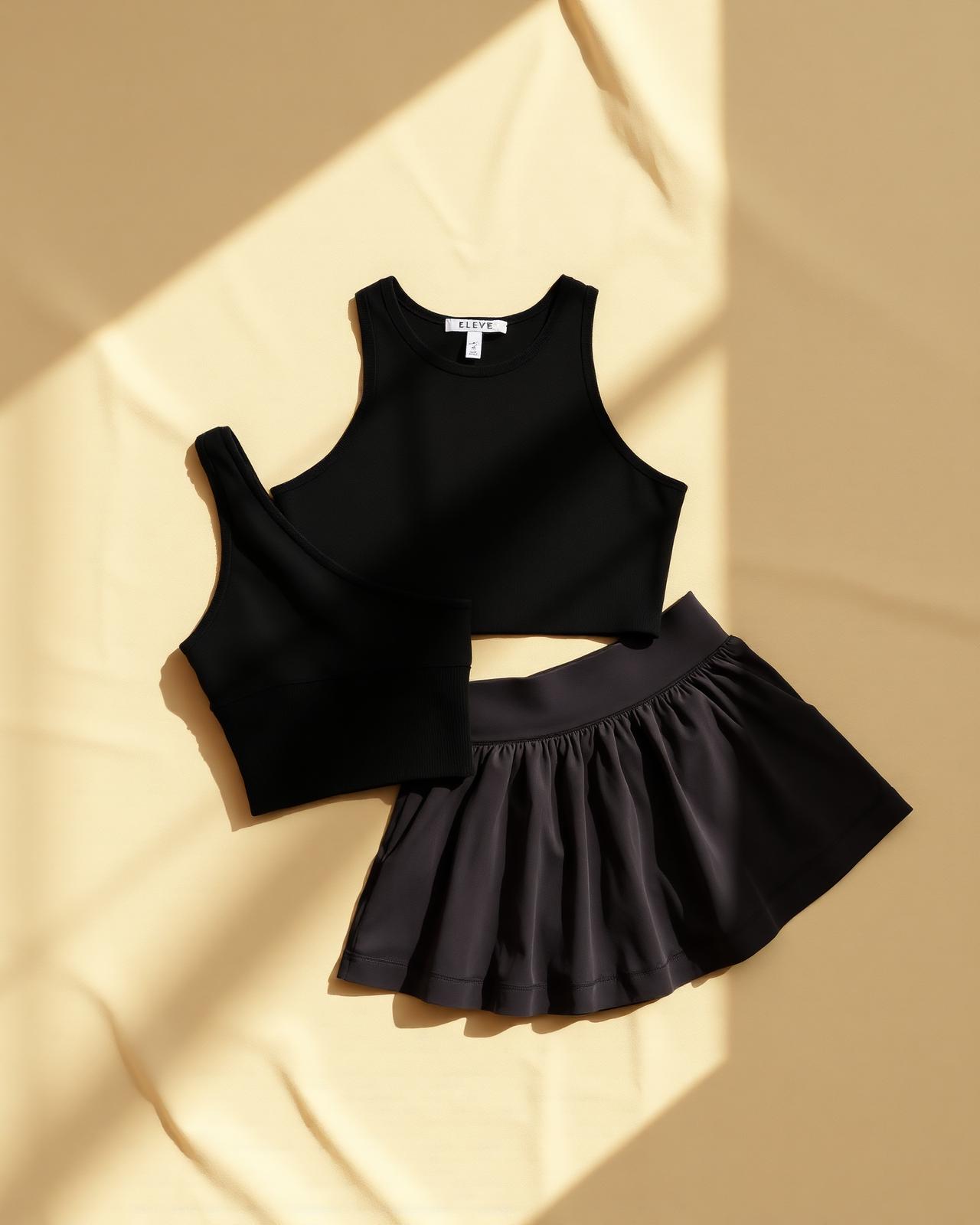 Elevé black cropped vest and skirt fabric detail